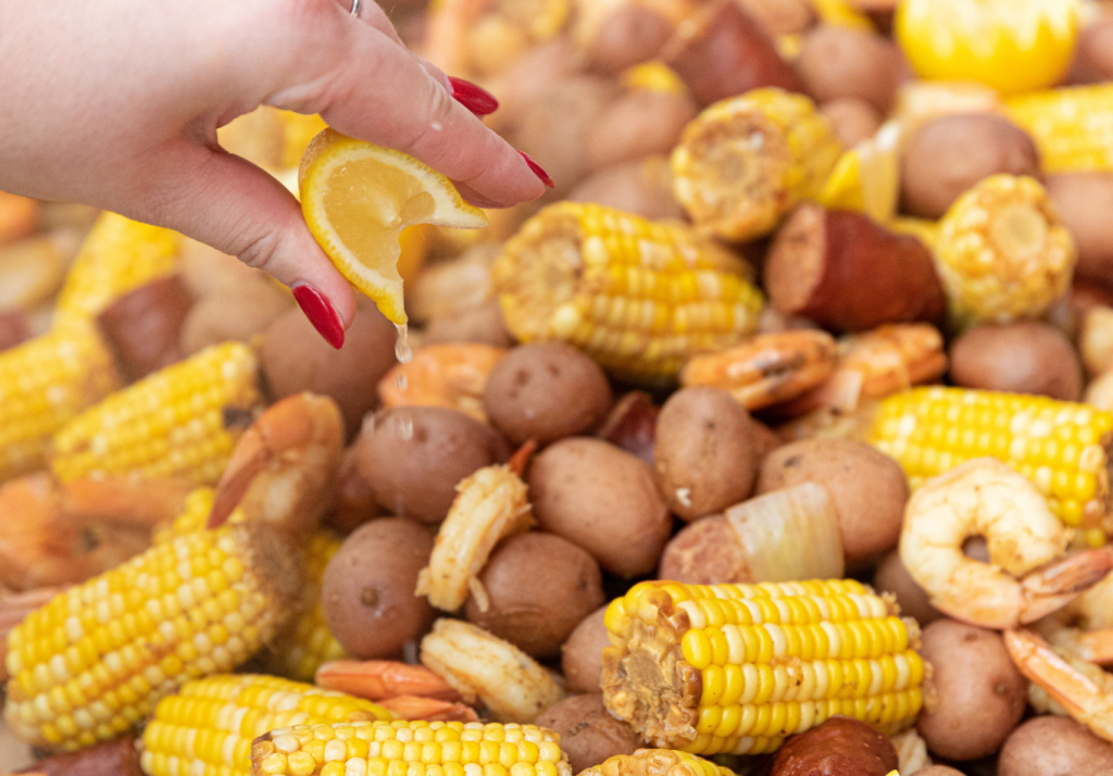 Fresh shrimp, corn, potatoes, and sausage prepared for a Lowcountry boil.