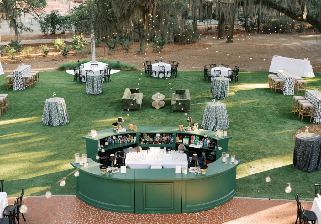 Custom circular bar setup for an outdoor wedding reception in Charleston.