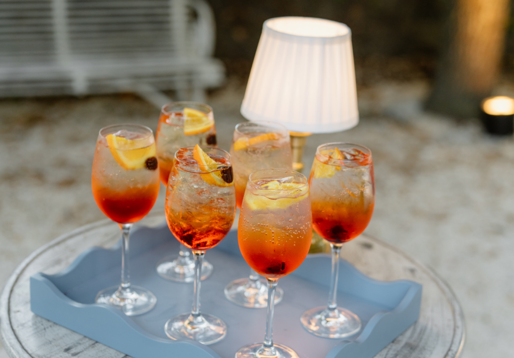 Aperol Spritz cocktails displayed for wedding guests during cocktail hour.
