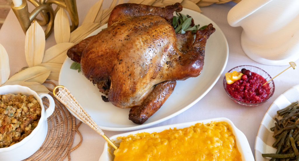 Thanksgiving dinner from Hamby Catering featuring roasted turkey, macaroni and cheese, stuffing, cranberry sauce and green beans